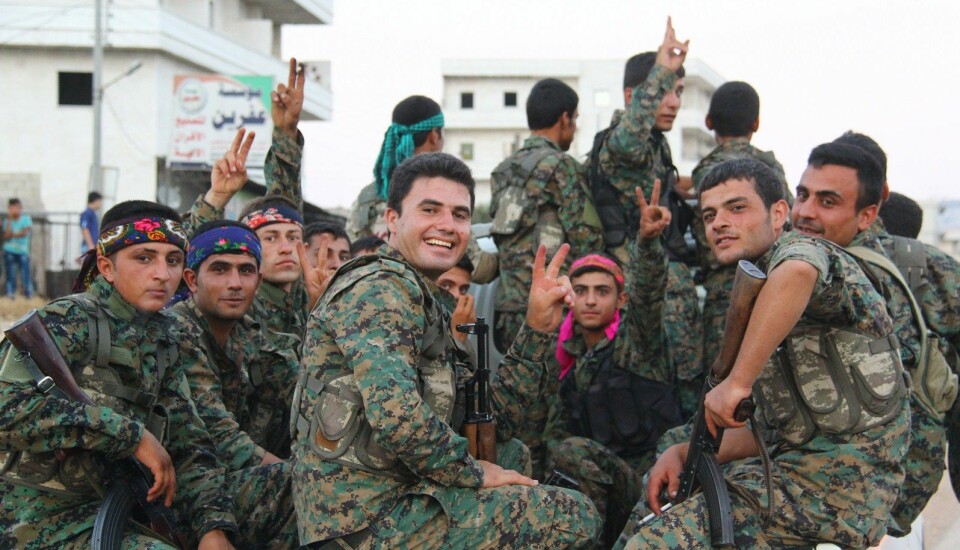 Medlemmer av den kurdiske YPG-militsen. Kurderne står nå overfor en ny trussel etter at Donald Trump gjorde det klart at amerikanske styrker ville trekke seg ut av kurdisk-kontrollerte områder i Syria for å gi plass til en tyrkisk invasjon Foto: Flickr (CC BY 2.0)