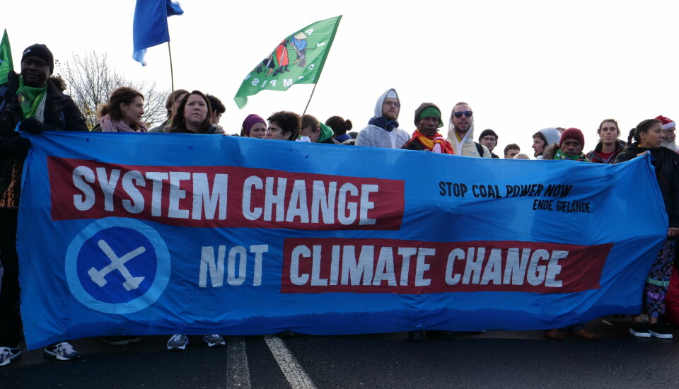 Gruppen bak rapporten inngår i den internasjonale «System change, not climate change»-bevegelsen. Her fra en demonstrasjon i Tyskland i 2017.