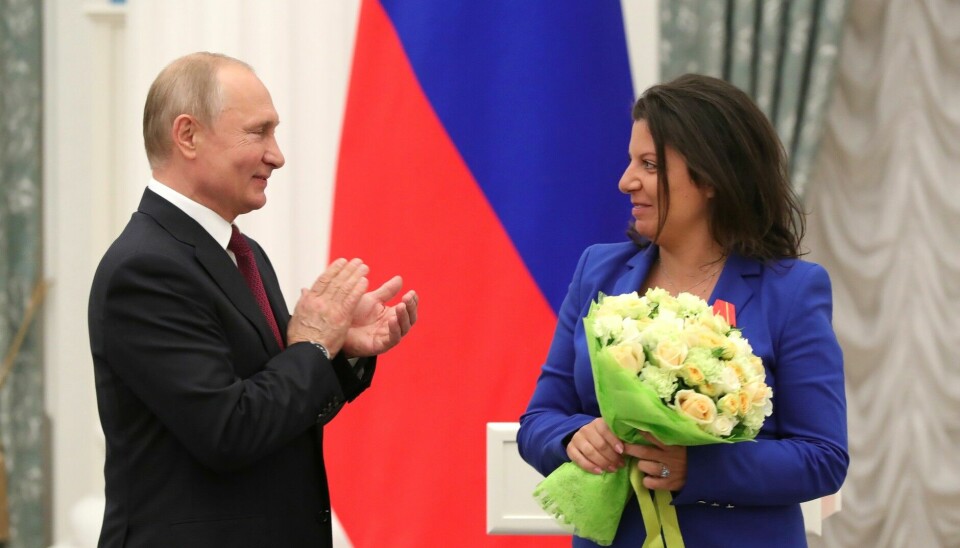 Vladimir Putin og sjefredaktør for RT Margarita Simonjan.
